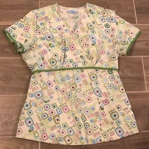 Scrub top green design with empire cinch